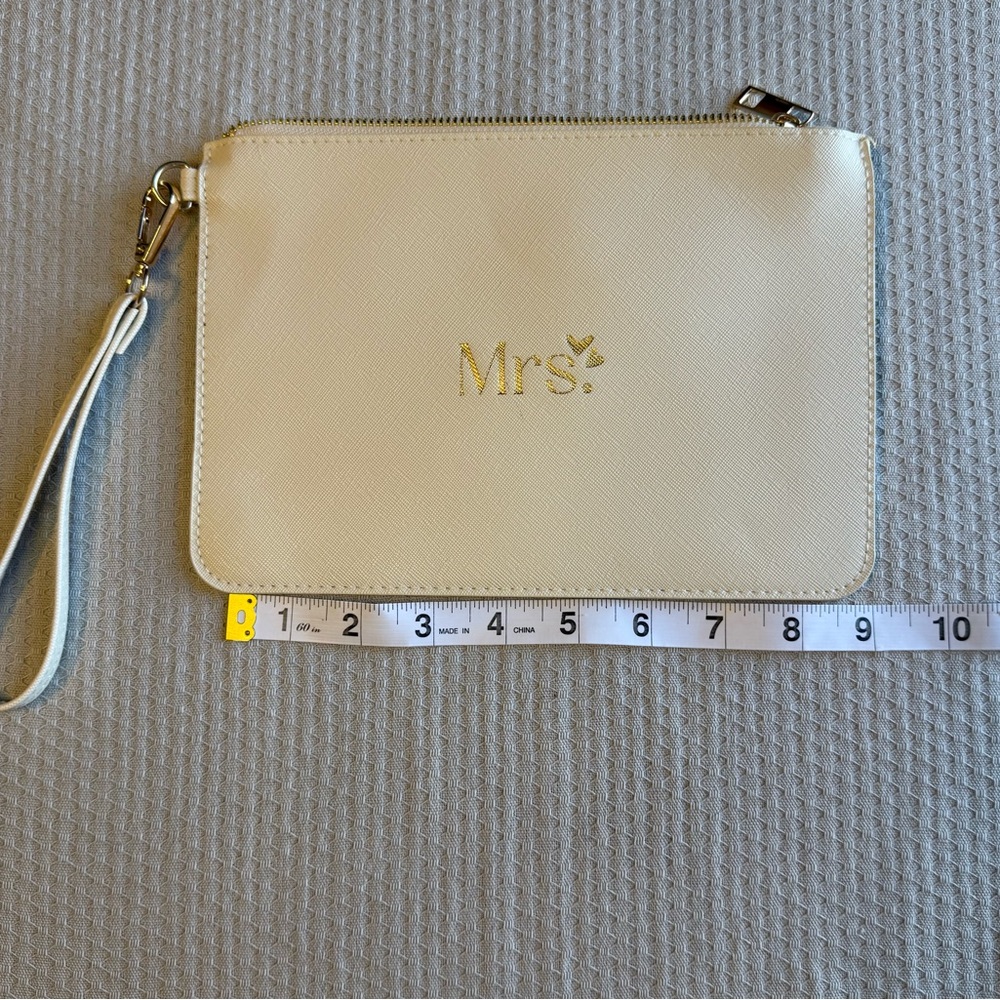 “Mrs.” Clutch wristlet.